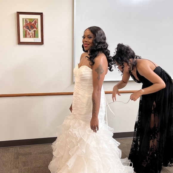 I am selling my strapless, ivory , ruffled mermaid wedding gown. - Picture 10 of 11